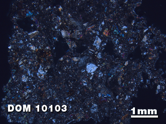 Thin Section Photo of Sample DOM 10103 at 1.25X Magnification in Cross-Polarized Light