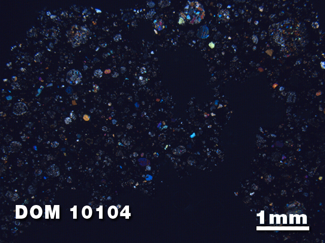 Thin Section Photo of Sample DOM 10104 at 1.25X Magnification in Cross-Polarized Light
