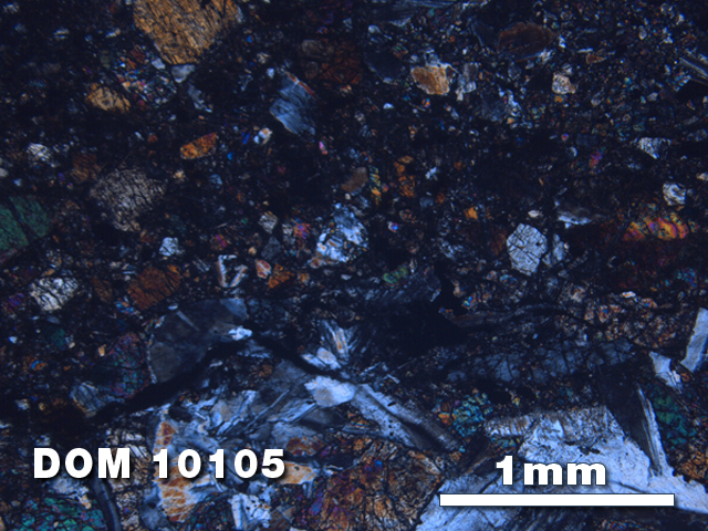 Thin Section Photo of Sample DOM 10105 at 2.5X Magnification in Cross-Polarized Light