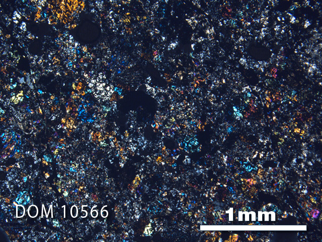 Thin Section Photo of Sample DOM 10566 in Cross-Polarized Light with 2.5X Magnification