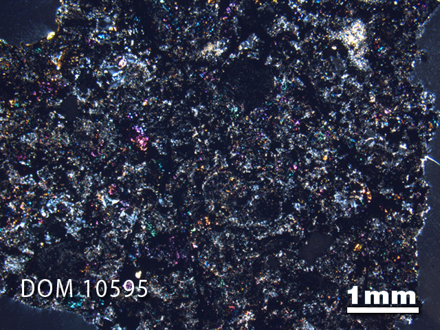 Thin Section Photo of Sample DOM 10595 in Cross-Polarized Light with 1.25X Magnification