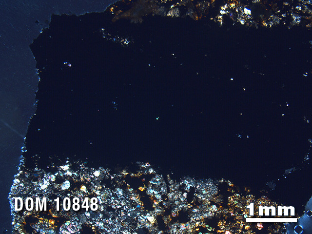 Thin Section Photo of Sample DOM 10848 in Cross-Polarized Light with 1.25X Magnification