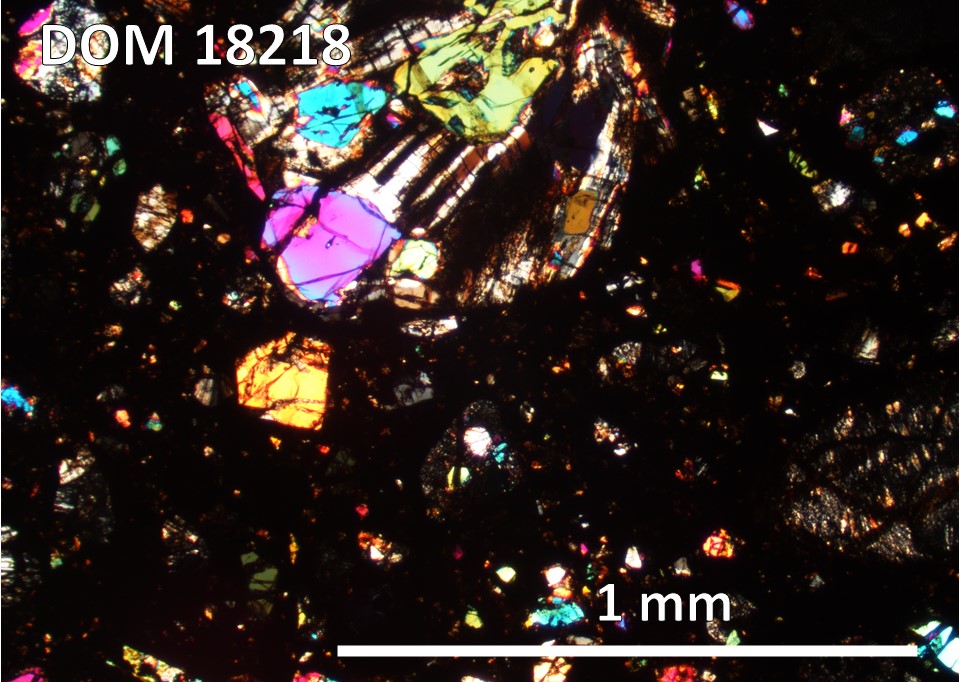 Thin Section Photo of Sample DOM 18218,2 at 5x magnification in Cross Polarized Light