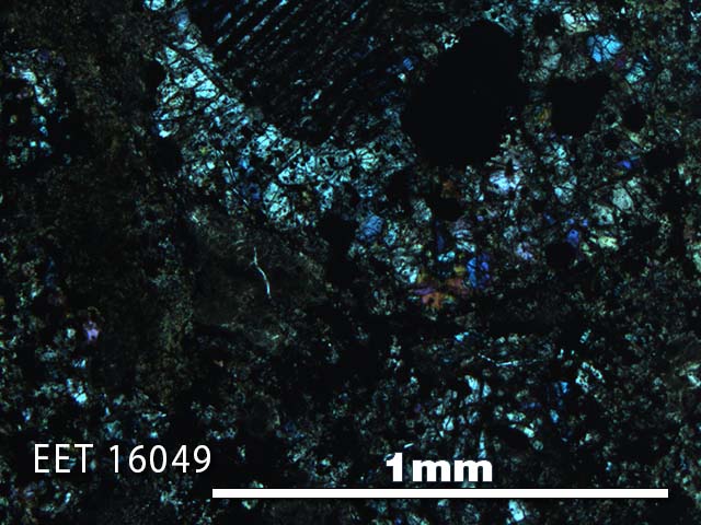 Thin Section Photo of Sample EET 16049 in Cross-Polarized Light with 5X Magnification