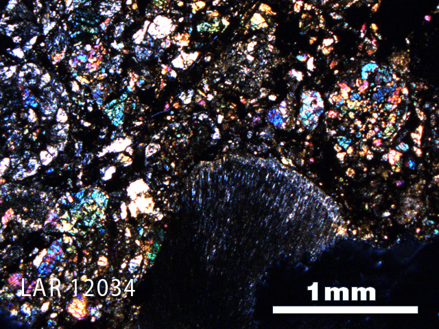 Thin Section Photo of Sample LAR 12034 in Cross-Polarized Light with 2.5X Magnification