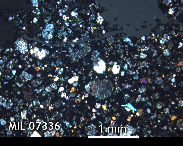 Thin Section Photo of Sample MIL 07336 in Cross-Polarized Light with 2.5x Magnification