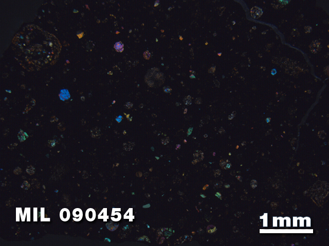 Thin Section Photo of Sample MIL 090454 in Cross-Polarized Light with 1.25X Magnification