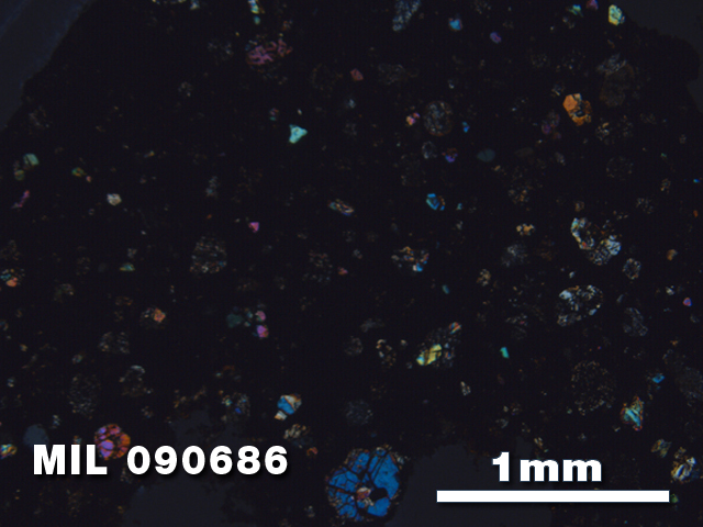 Thin Section Photo of Sample MIL 090686 in Cross-Polarized Light with 2.5X Magnification