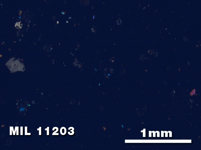 Thin Section Photo of Sample MIL 11203 in Cross-Polarized Light with 2.5X Magnification