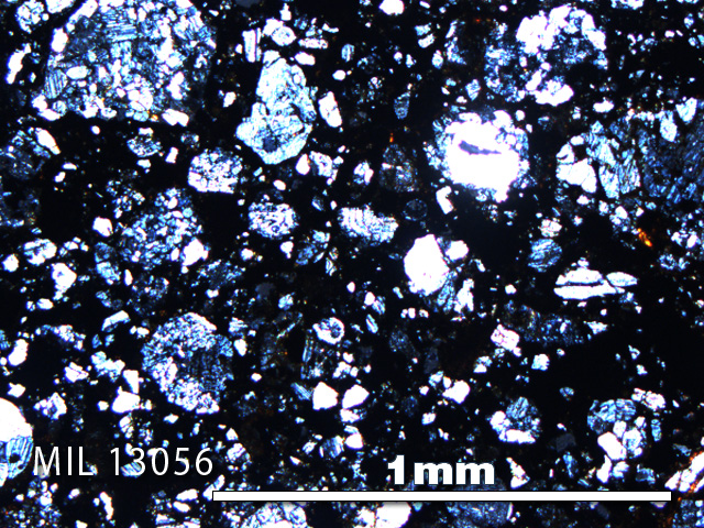 Thin Section Photo of Sample MIL 13056 in Cross-Polarized Light with 5X Magnification