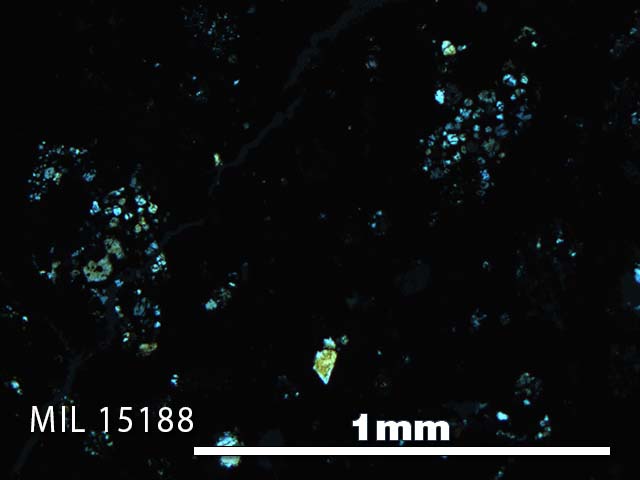 Thin Section Photo of Sample MIL 15188 in Cross-Polarized Light with 5X Magnification