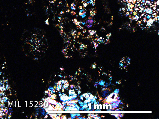 Thin Section Photo of Sample MIL 15230 in Cross-Polarized Light with 5X Magnification