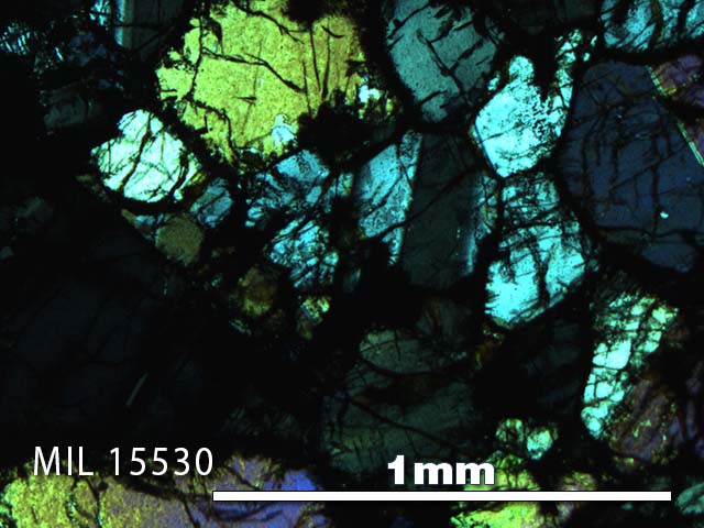 Thin Section Photo of Sample MIL 15530 in Cross-Polarized Light with 5X Magnification