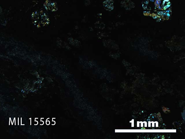 Thin Section Photo of Sample MIL 15565 in Cross-Polarized Light with 2.5X Magnification
