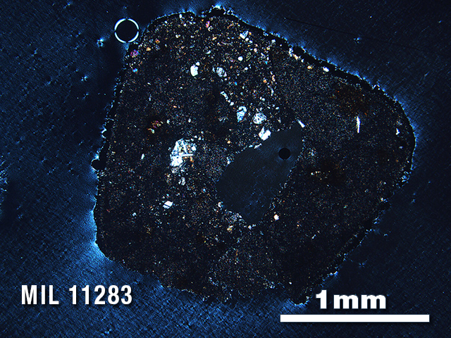 Thin Section Photo of Sample MIL 11283 in Cross-Polarized Light with 2.5X Magnification