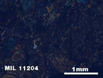 Thin Section Photo of Sample MIL 11204 in Cross-Polarized Light with 2.5X Magnification