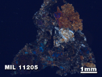 Thin Section Photo of Sample MIL 11205 in Cross-Polarized Light with 1.25X Magnification