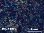 Thin Section Photo of Sample MIL 11207 in Cross-Polarized Light with 2.5X Magnification