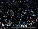 Thin Section Photo of Sample MIL 13323 in Cross-Polarized Light with 5X Magnification