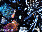 Thin Section Photo of Sample MIL 15428 in Cross-Polarized Light with 2.5X Magnification