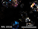 Thin Section Photo of Sample MIL 15516 in Cross-Polarized Light with 5X Magnification