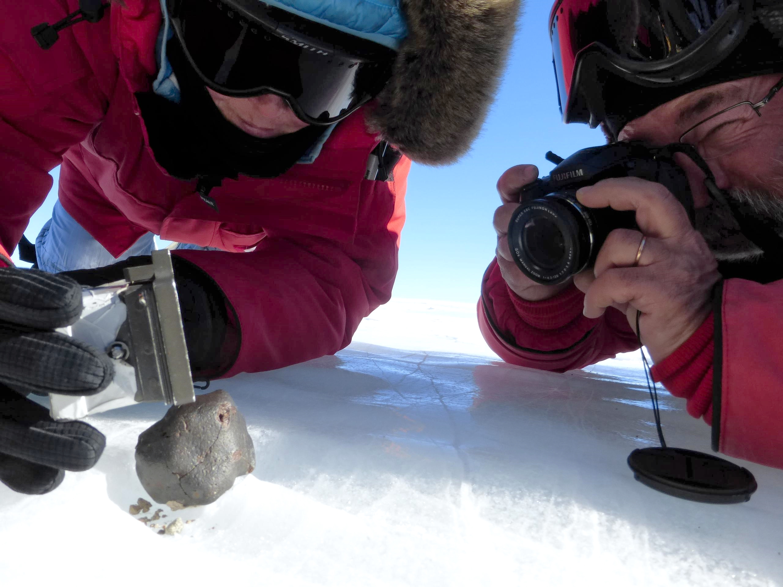 Alex Meshik and Morgan Nunn Martinez collecting a meteorite in the Miller Range, 2013-2014 field season