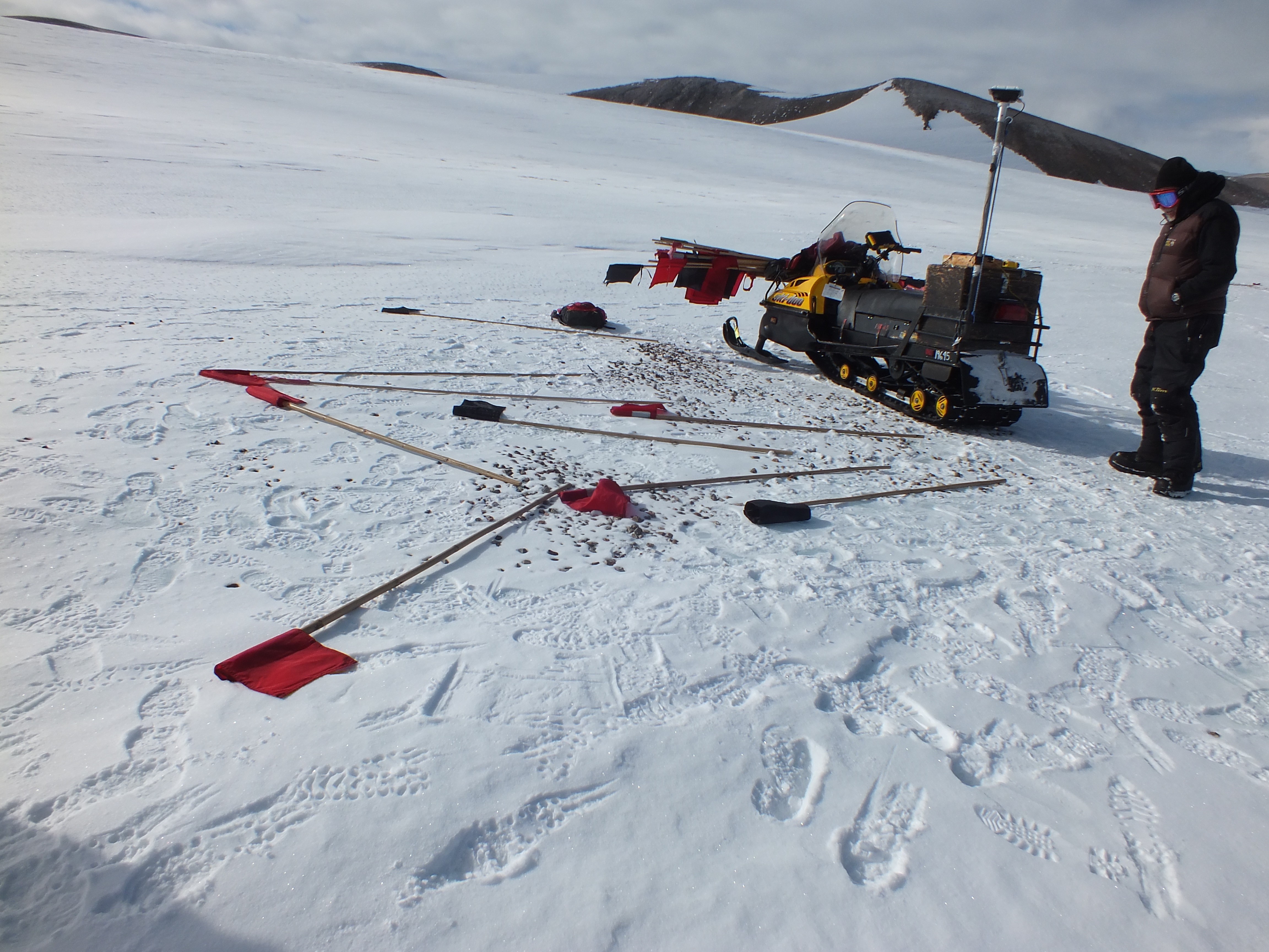 Windrows at an icefield in the north Miller Range with flags marking meteorites