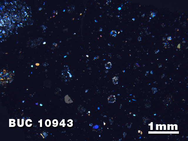 Thin Section Photo of Sample BUC 10943 at 1.25X Magnification in Cross-Polarized Light