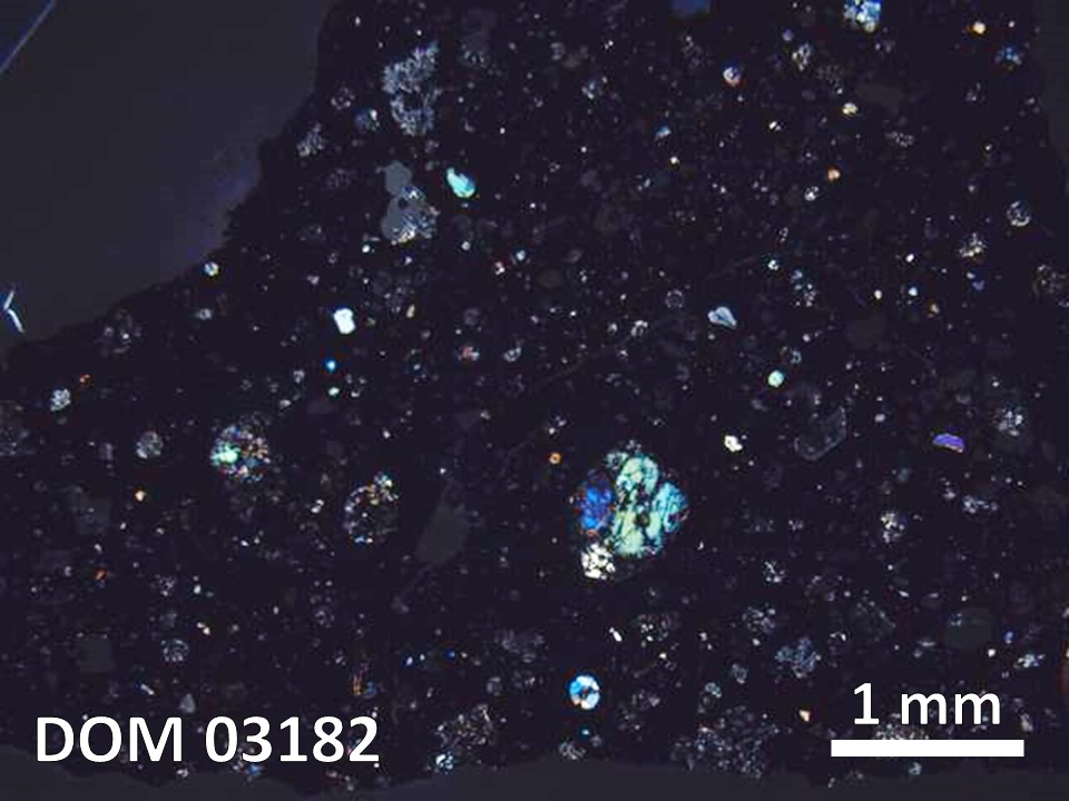 Thin Section Photo of Sample DOM 03182 in Cross-Polarized Light with  Magnification