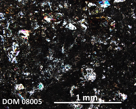 DOM 08005 Meteorite Thin Section Photo with 5x magnification in Cross-Polarized Light