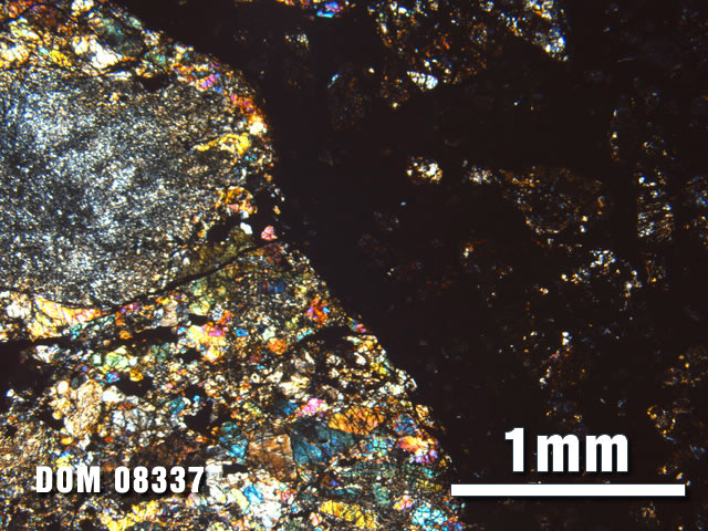 Thin Section Photo of Sample DOM 08337 at 2.5X Magnification in Cross-Polarized Light