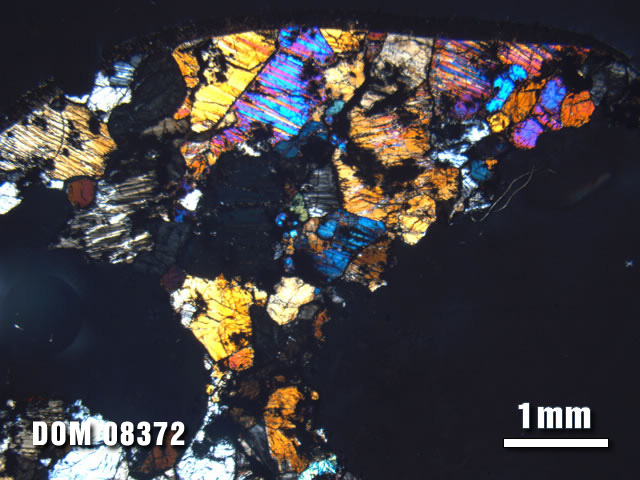 Thin Section Photo of Sample DOM 08372 at 1.25X Magnification in Cross-Polarized Light