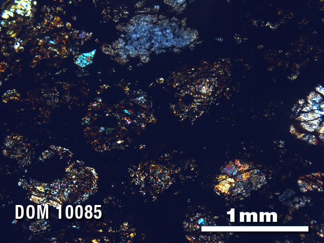 Thin Section Photo of Sample DOM 10085 in Cross-Polarized Light with 2.5X Magnification