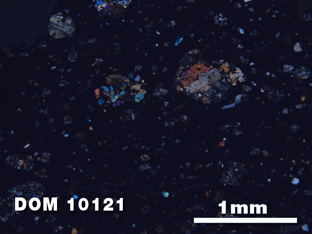 Thin Section Photo of Sample DOM 10121 at 2.5X Magnification in Cross-Polarized Light