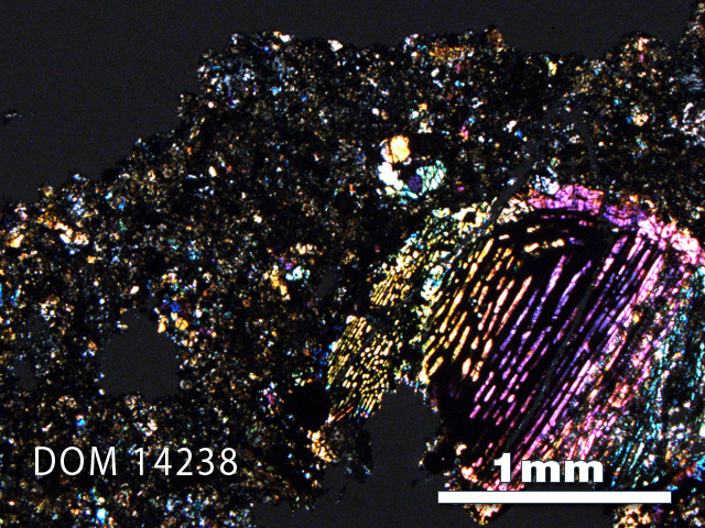 Thin Section Photo of Sample DOM 14238 in Cross-Polarized Light with 2.5X Magnification