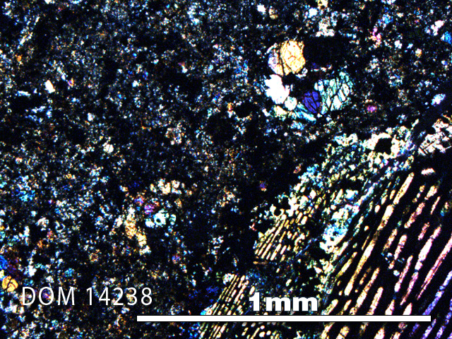 Thin Section Photo of Sample DOM 14238 in Cross-Polarized Light with 5X Magnification