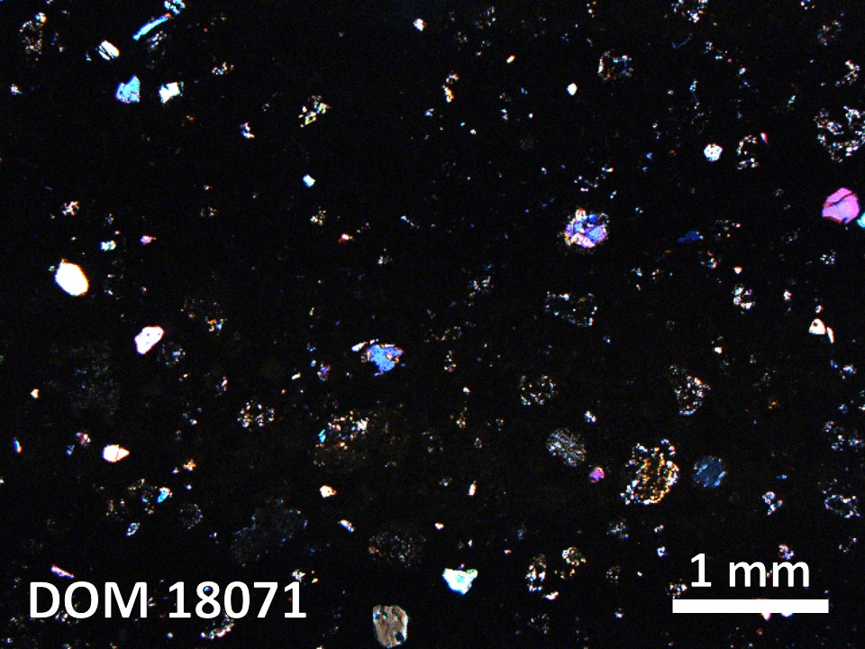 Thin Section Photo of Sample DOM 18071 in Cross-Polarized Light with 2.5X Magnification