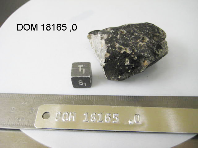 Lab Photo of Sample DOM 18165 Displaying Top South Orientation