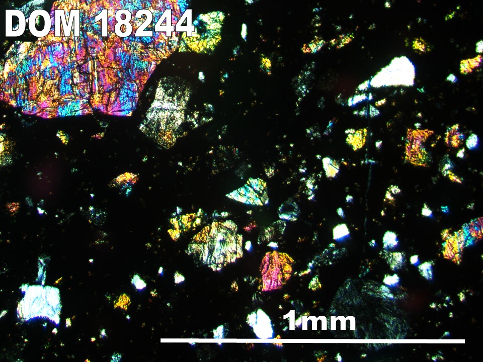 Thin Section Photo of Sample DOM 18244 in Cross-Polarized Light with 5X Magnification