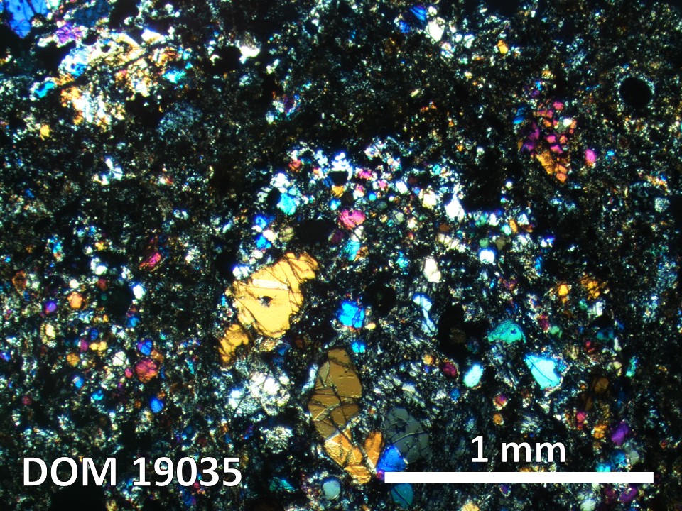 Thin Section Photo of Sample DOM 19035 in Cross-Polarized Light with 2.5X Magnification