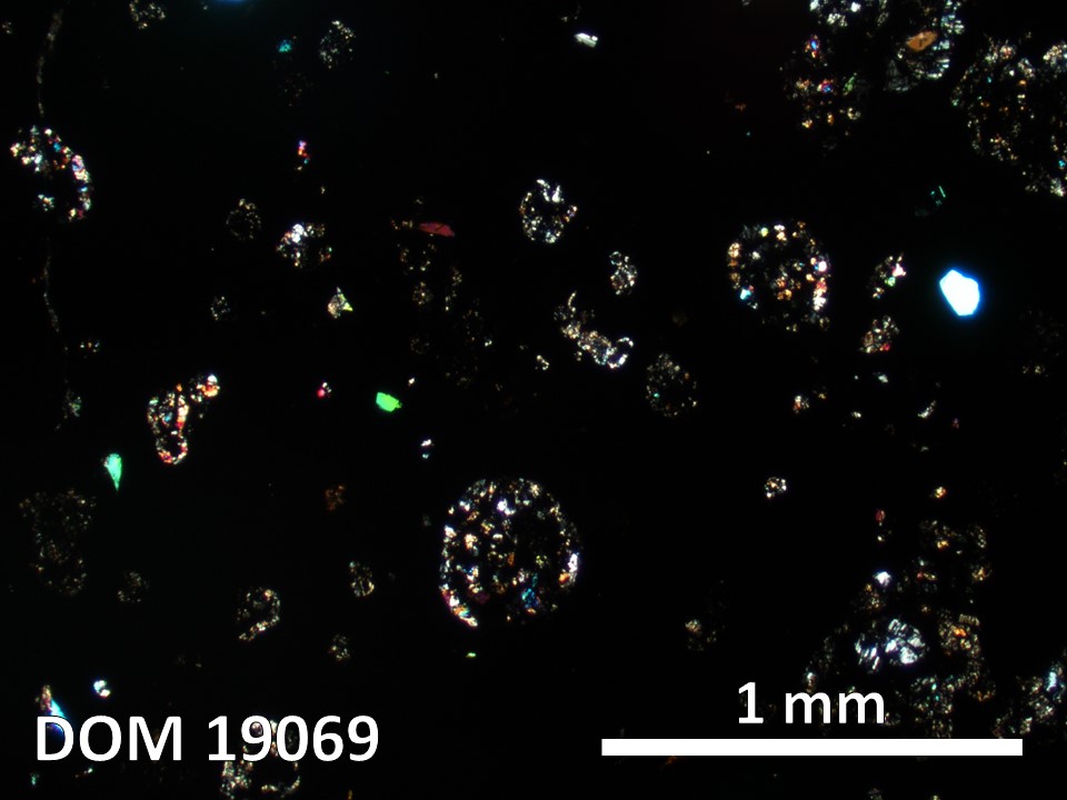 Thin Section Photo of Sample DOM 19069 in Cross-Polarized Light with 2.5X Magnification