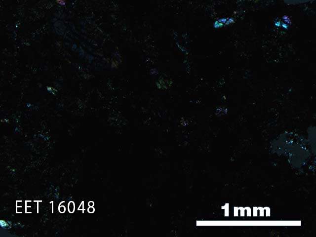 Thin Section Photo of Sample EET 16048 in Cross-Polarized Light with 2.5X Magnification