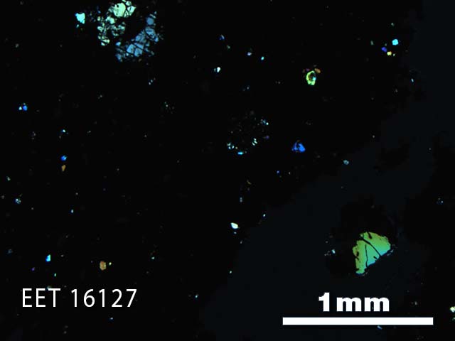 Thin Section Photo of Sample EET 16127 in Cross-Polarized Light with 2.5X Magnification