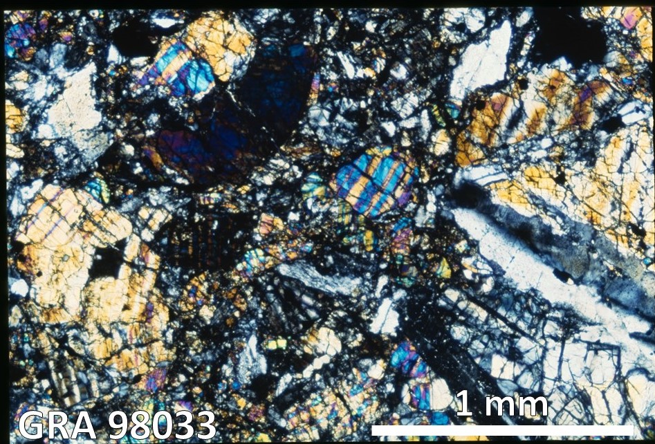 Thin Section Photo of Sample GRA 98033 in Cross-Polarized Light with 2.5X Magnification