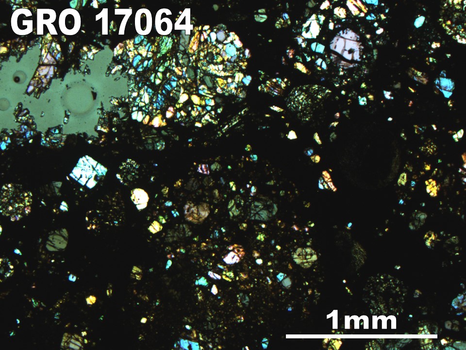 Thin Section Photo of Sample GRO 17064 in Cross-Polarized Light with 2.5X Magnification