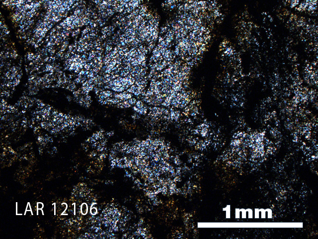 Thin Section Photo of Sample LAR 12106 in Cross-Polarized Light with 2.5X Magnification