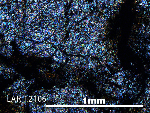Thin Section Photo of Sample LAR 12106 in Cross-Polarized Light with 5X Magnification