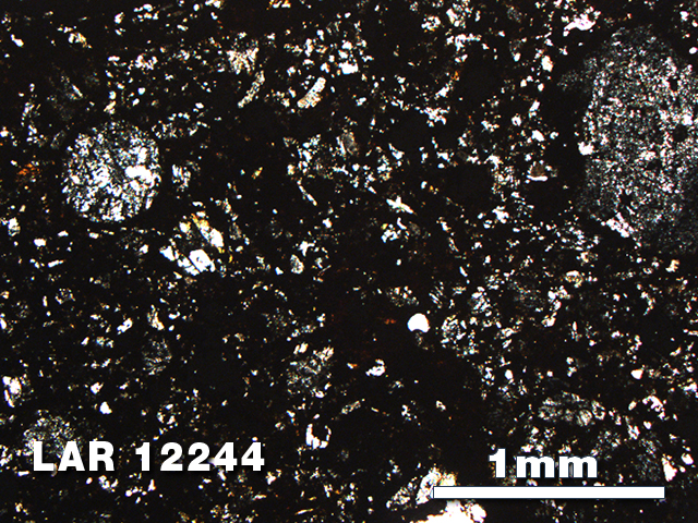 Thin Section Photo of Sample LAR 12244 in Plane-Polarized Light with 2.5X Magnification