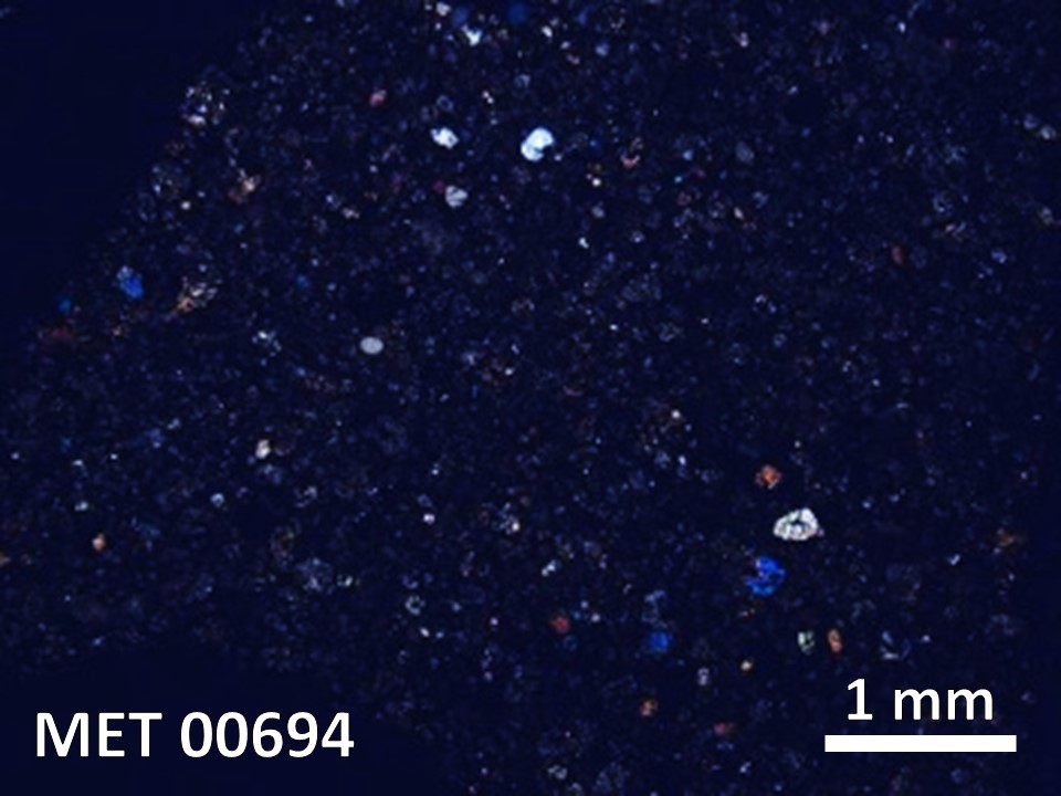 Thin Section Photo of Sample MET 00694 in Cross-Polarized Light with  Magnification