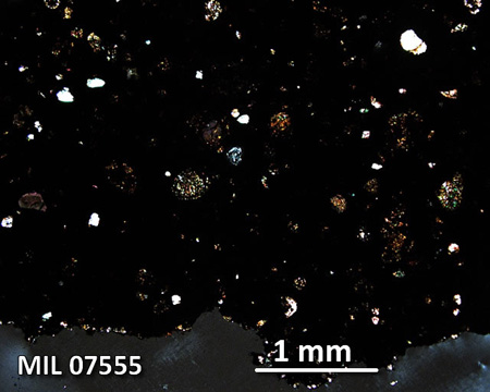 MIL 07555 Meteorite Thin Section Photo with 2.5x magnification in Cross-Polarized Light